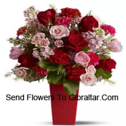 Red Roses, Red Carnations And Pink Roses With Seasonal Fillers In A Glass Vase -- 25 Stems And Fillers