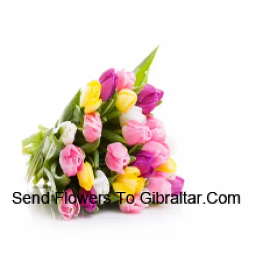 A Beautiful Hand Bunch Of Mixed Colored Tulips With Seasonal Fillers - Please Note That In Case Of Non-Availability Of Certain Seasonal Flowers The Same Will Be Substituted With Other Flowers Of Same Value