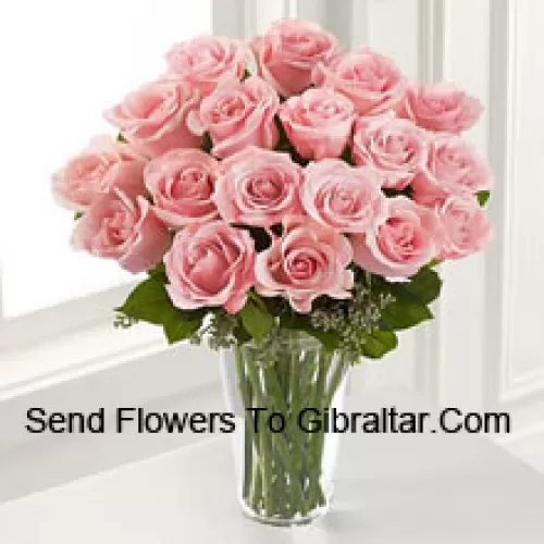 19 Pink Roses With Some Ferns In A Vase