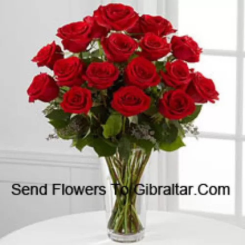 19 Red Roses With Some Ferns In A Vase