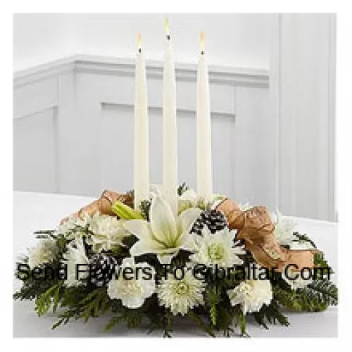 Celebrates the holiday season with winter grace and style. White Asiatic lilies, carnations and chrysanthemums create an exquisite display accented with holiday greens, snow-tipped pinecones and sheer copper ribbon. Surrounding three white taper candles, this holiday centerpiece will add light and love to their seasonal celebration. (Please Note That We Reserve The Right To Substitute Any Product With A Suitable Product Of Equal Value In Case Of Non-Availability Of A Certain Product)